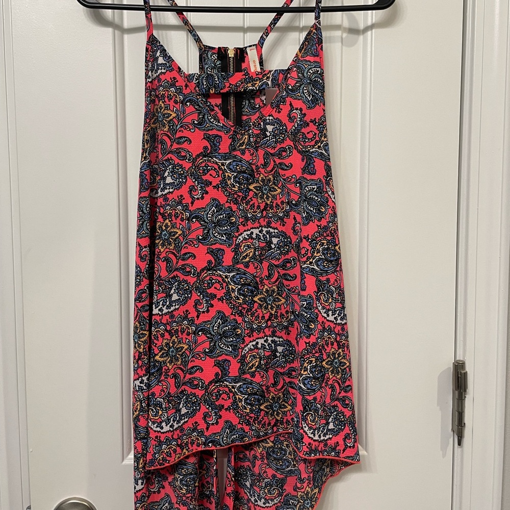 size large reddish top with zipper back.
